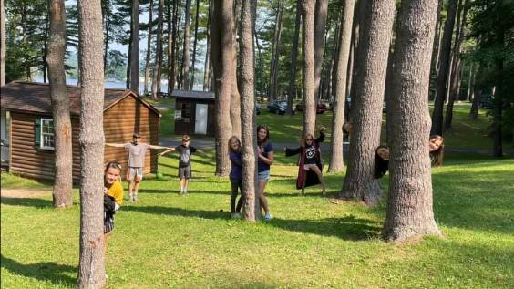 Camping kids playing in trees at Lake Lauderdale